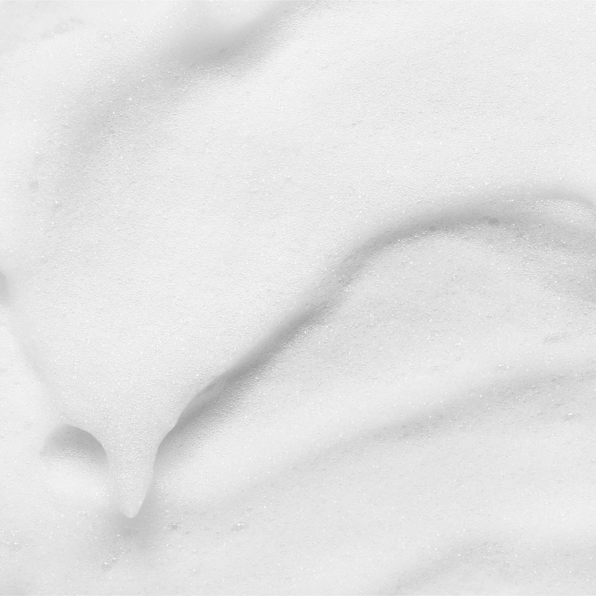 Gros plan sur la texture de mousse blanche