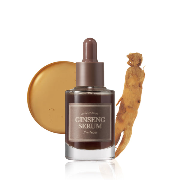 Flacon de sérum devant une racine de ginseng et une goutte ambrée
