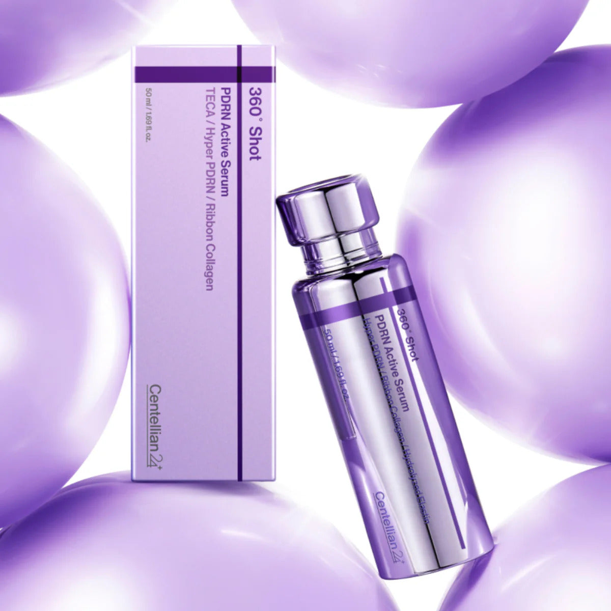 Flacon violet de sérum et sa boîte parmi des sphères violettes