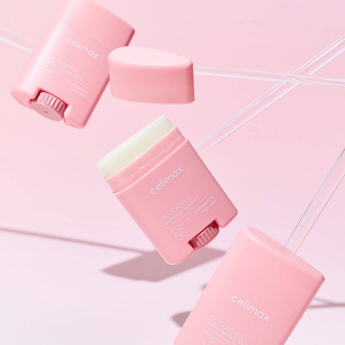 Plusieurs sticks solaires roses, dont un ouvert