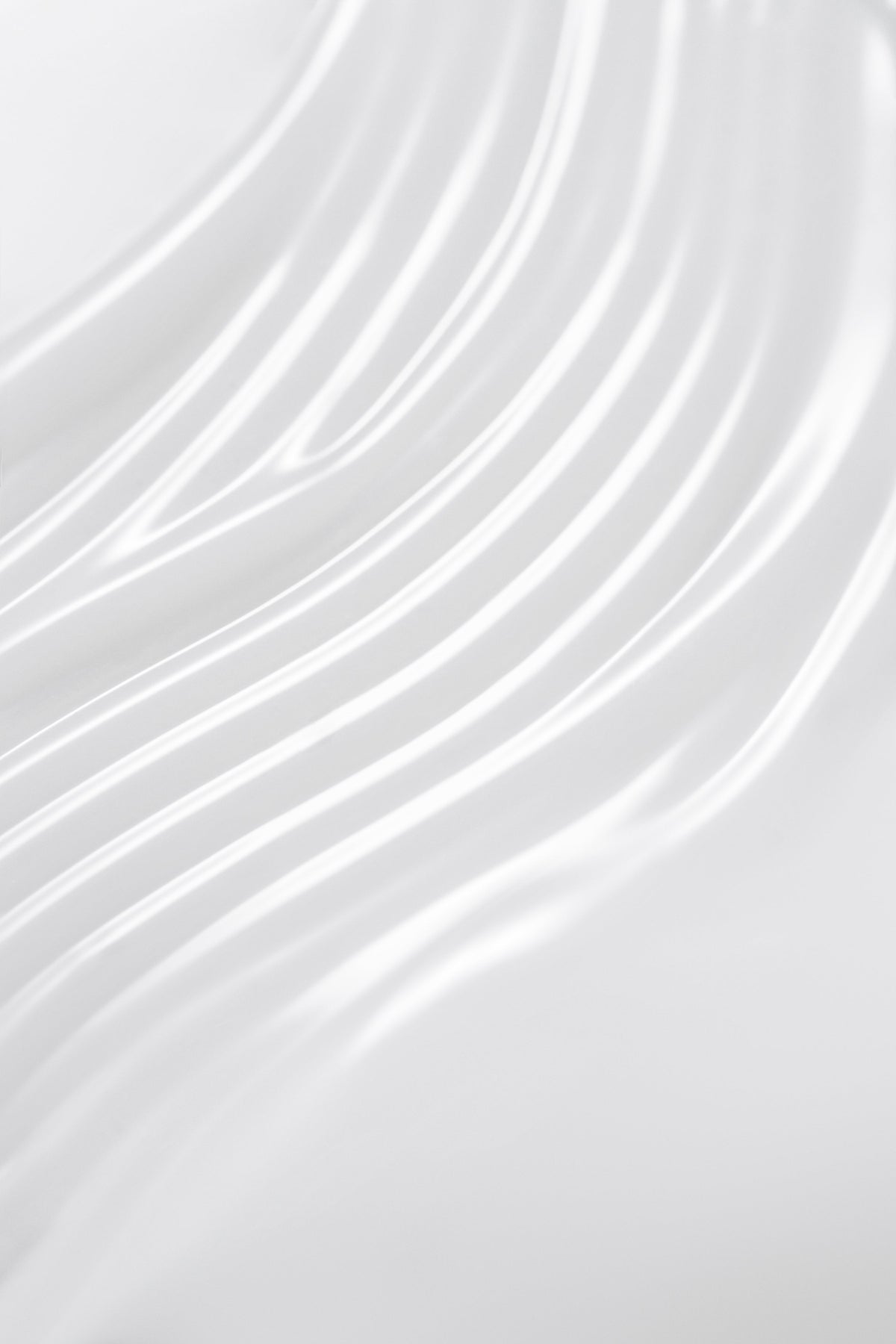 Texture de sérum blanc étalée en fines bandes