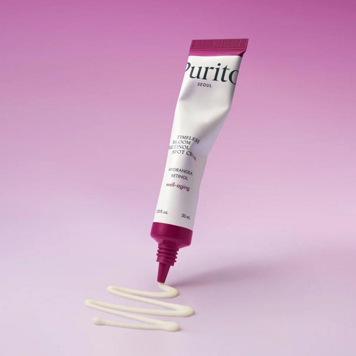 Crème claire distribuée depuis le tube à embout rose