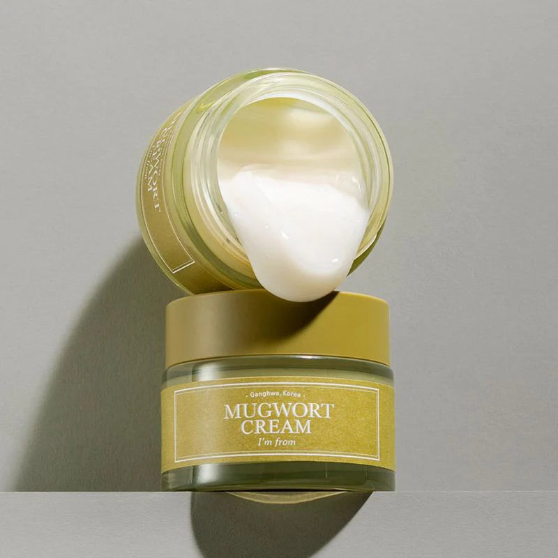 Pot de crème ouvert incliné au-dessus d&