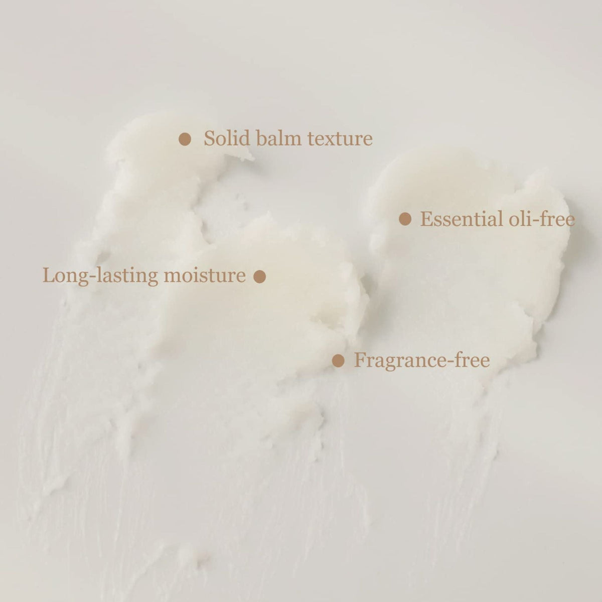 Texture solide du baume blanc, avec les mentions hydratation, sans parfum et sans huiles essentielles