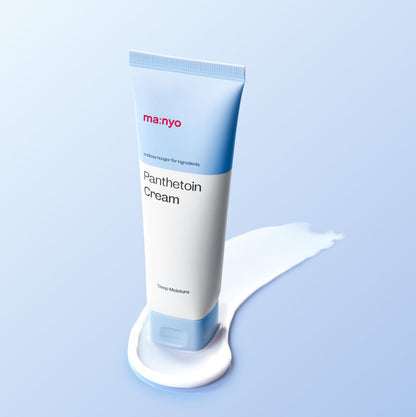 Tube bleu et blanc de crème sur une trace blanche