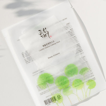 Sachet de masque blanc illustré de feuilles de centella