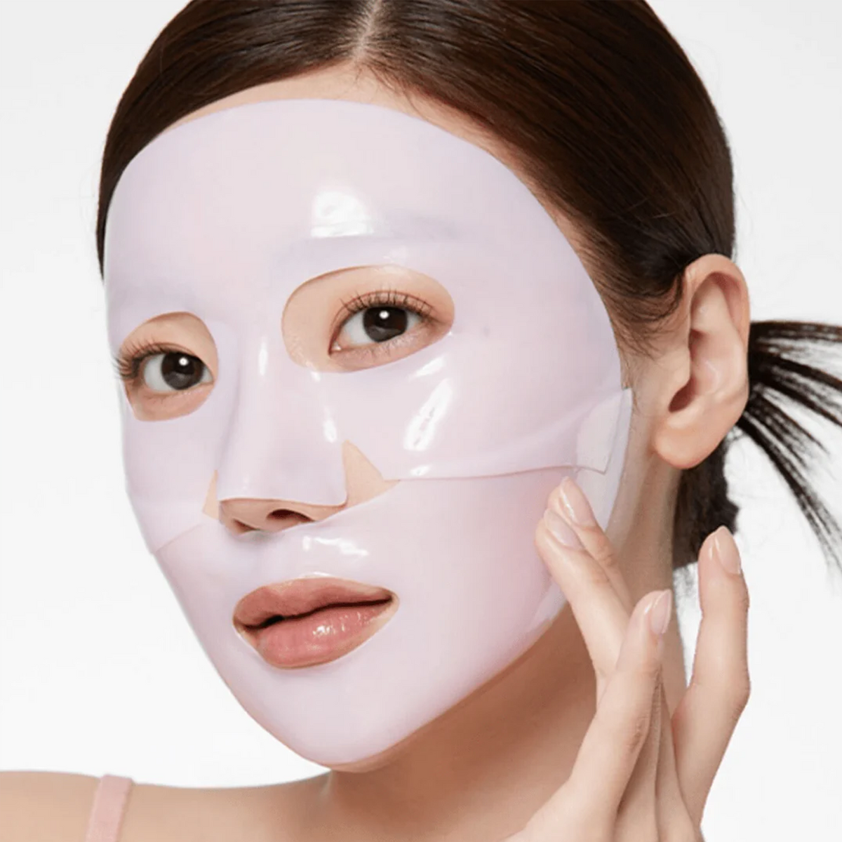 Masque gel rose en deux parties ajusté sur le visage