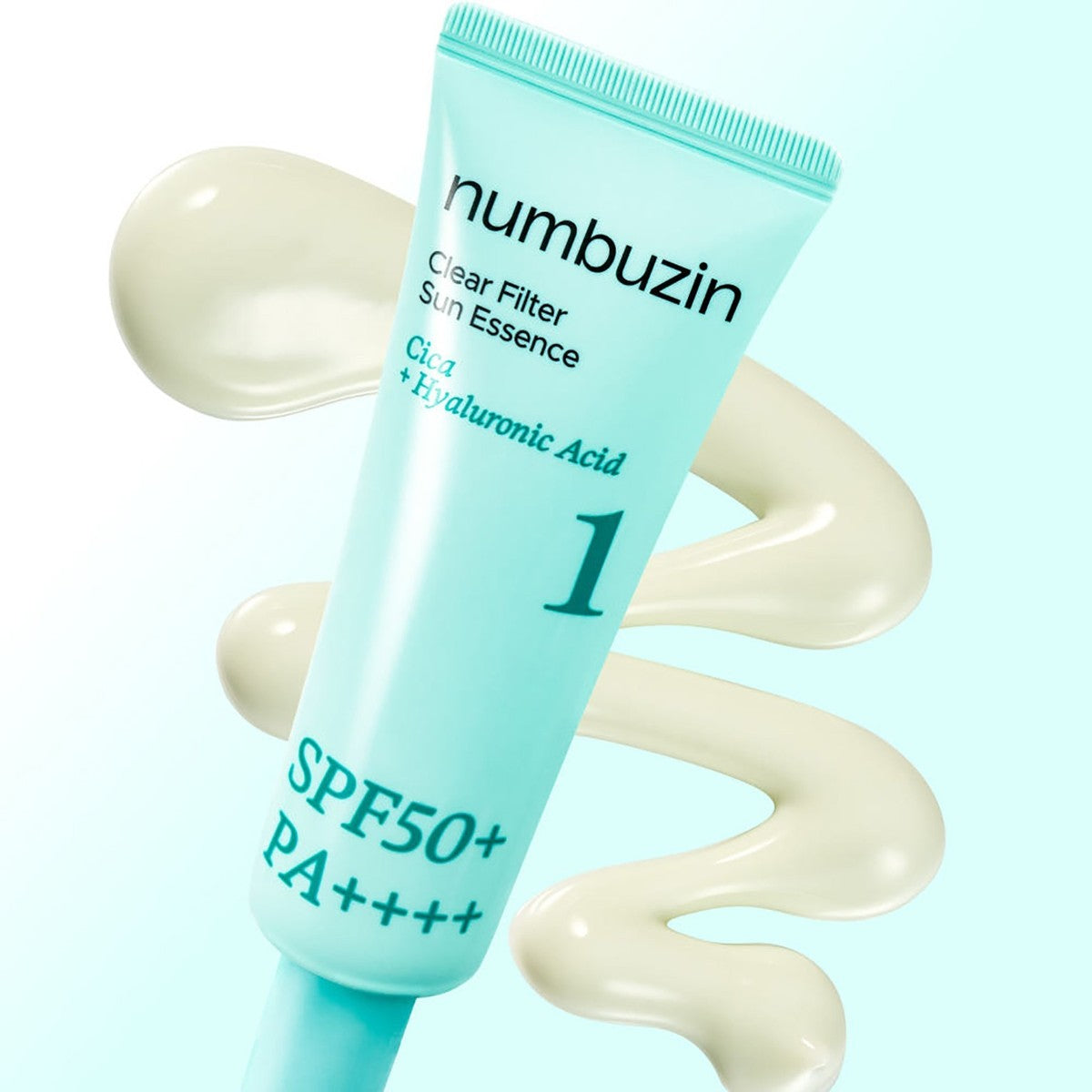 Tube turquoise de solaire devant un ruban de crème