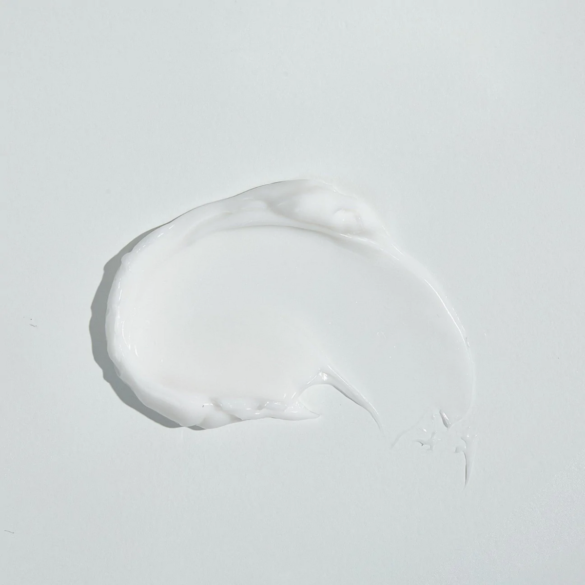 Texture épaisse de crème blanche étalée en cercle