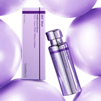 Flacon violet de sérum et sa boîte parmi des sphères violettes