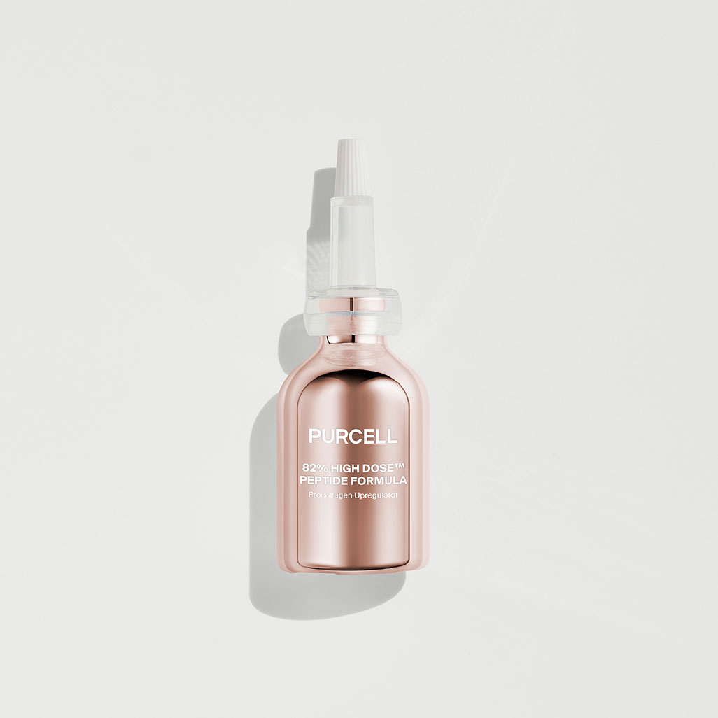 Flacon rose métallisé de sérum avec embout fin transparent