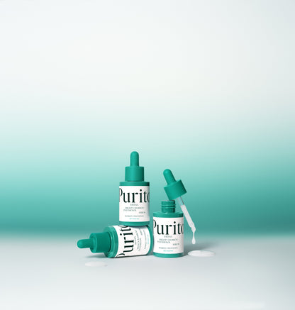 Flacons à pipette verte dont un ouvert avec du sérum blanc