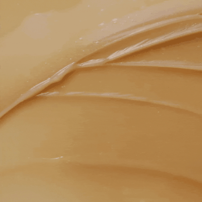 Texture de gel doré étalée en bandes