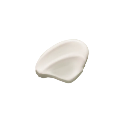 Trace de crème blanche dense
