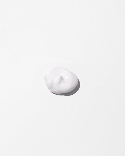 Noisette de crème blanche légèrement rosée