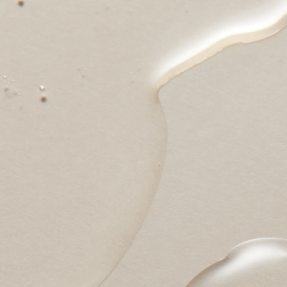 Texture fluide de la lotion transparente en fines nappes