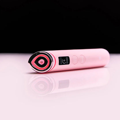 Appareil rose couché avec sa tête lumineuse rouge
