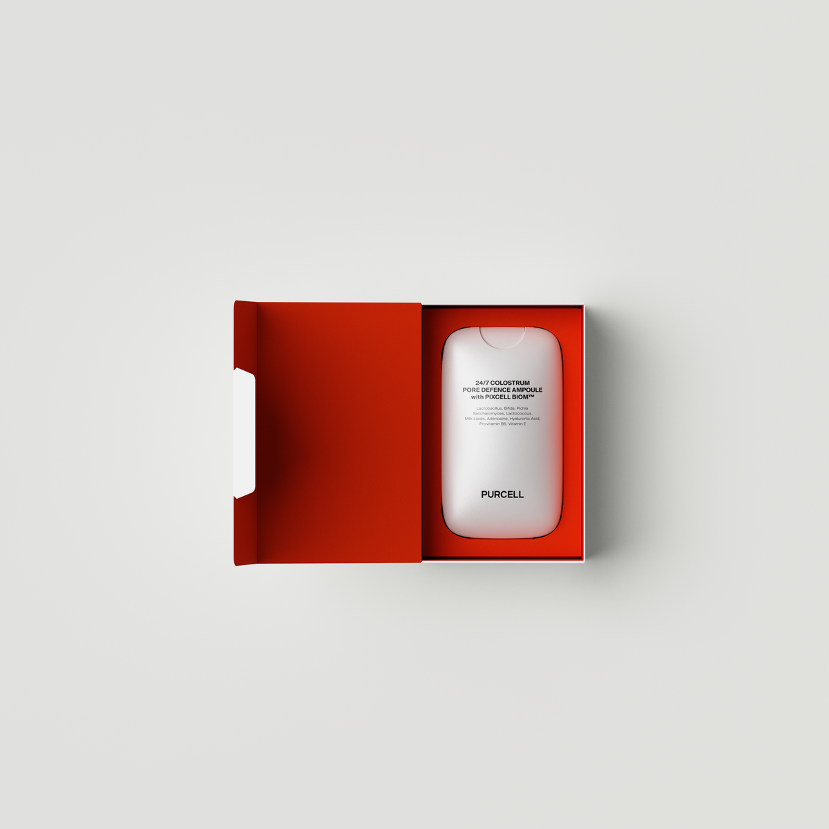 Flacon blanc de brume dans son coffret rouge ouvert
