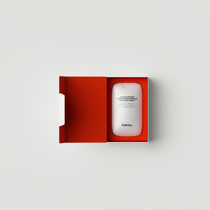 Flacon blanc de brume dans son coffret rouge ouvert