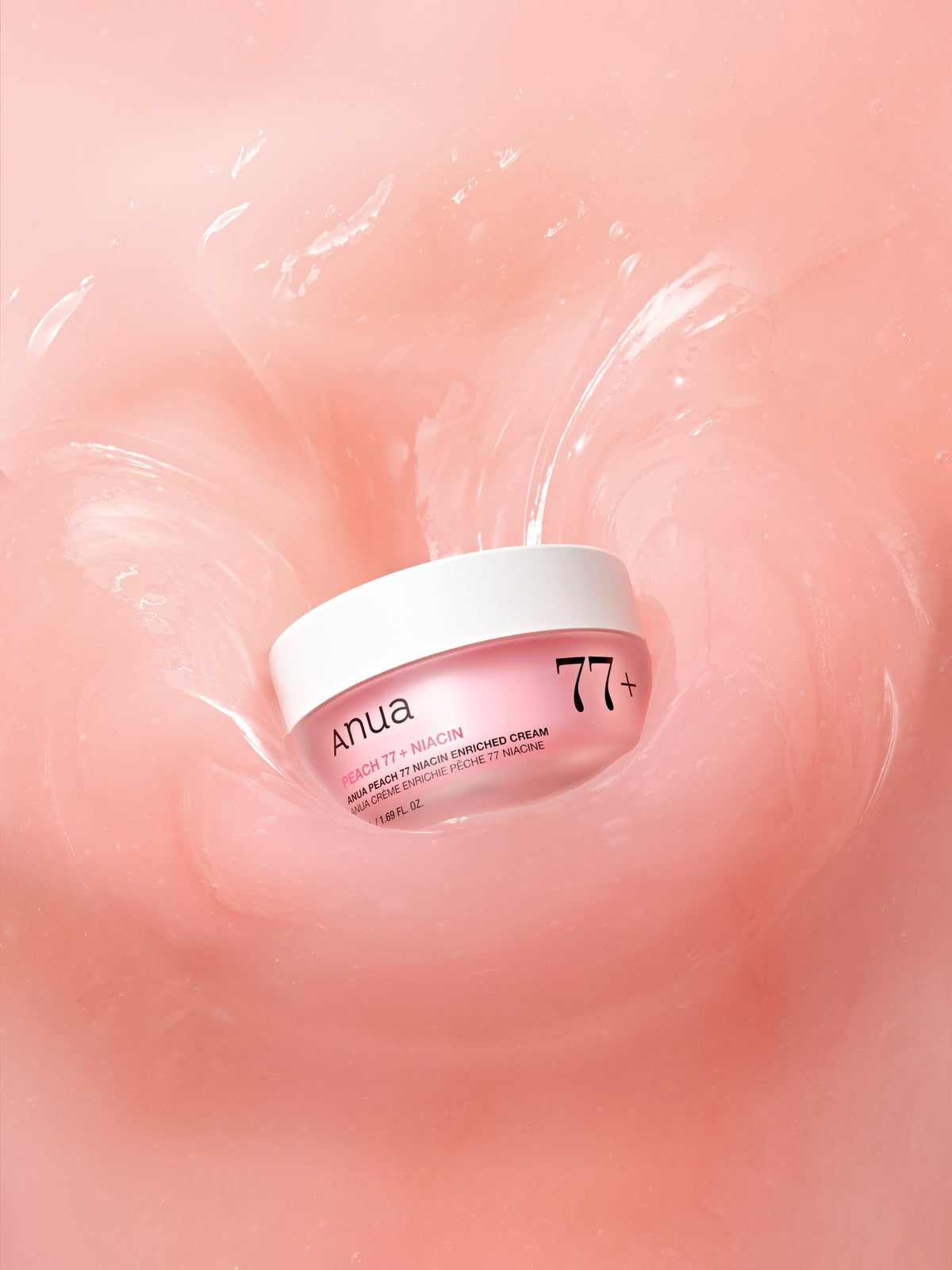 Pot rose de crème dans une texture de gel rosé